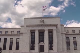 Fed to keep providing aid and sees no rate hike through 2022