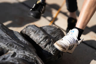 Protesters tore down Columbus statue at Minn. State Capitol, on Wednesday.