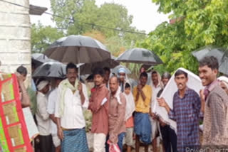 soybean farmers waiting in the queue for subsidised seeds in the Nirmal District Mudhole mandal at Agriculture Office