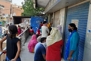 Crowd of consumers outside the central bank in jaitpur,delhi