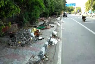 Stinky mud lying on the main road of Madipur