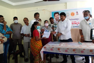 mla distributed insurance cheques