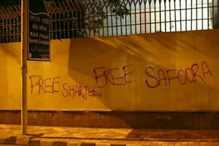 paint slogans of free safoora on walls of jamia