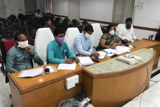 minister ktr video conference with municipal officers