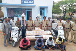 liquor-bottles-seized-at-vidapanakallu-checkpost-in-ananthapur-district