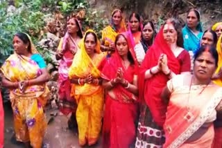 Women worshiping Corona as goddess in koderma