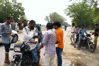 Youth distributes sweet water in Marhora village of Nuh