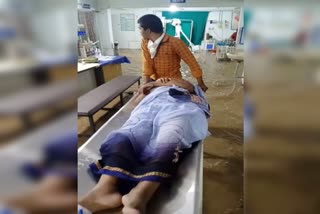 woman-patient-kept-in-the-casualty-ward-with-knee-deep-water