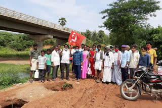 tribals and cpi leaders  protest  in vizag about bridge works