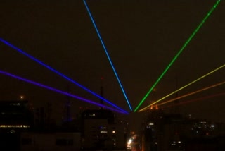 laser rainbow performance projected into the sky over Sao Paulo in Brazil