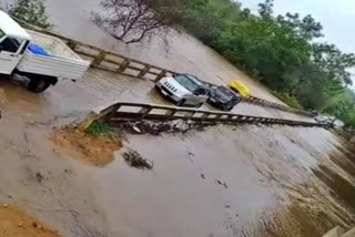 water flowing over the bridge