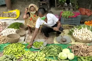 national player selling vegetable