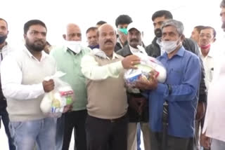 Kodagu: Distribution of food kit by JDS to private bus workers