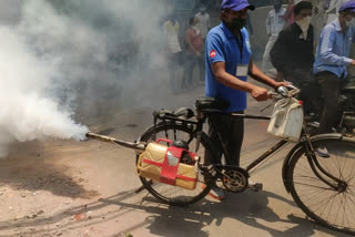 congress councillor doing fogging in mangolpuri  delhi