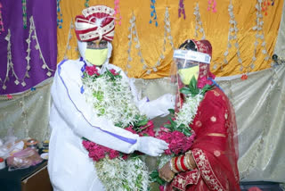 groom wear ppe kit on wedding at nalasopara