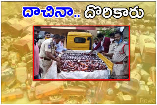 Arrest of accused of moving liquor to ap at durgapuram in suryapet district