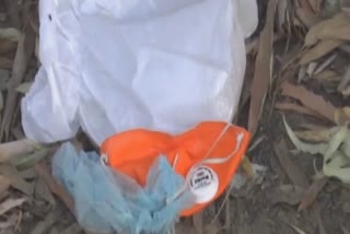 PPE kits thrown by policeman outside Covid Care Center in jalandhar