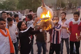 Youths boycott Chinese goods and burn effigy