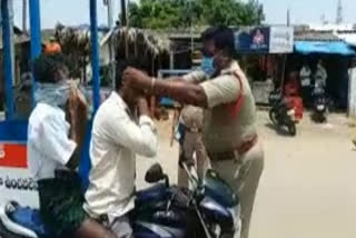 prathipadu police giving masks to people in east godavari district