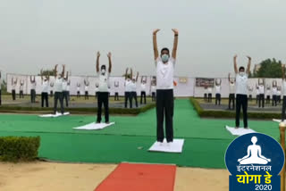 corona warriors perform yoga