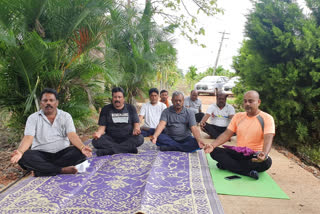 minister bc patil demonstrates yoga in haveri