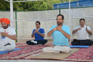 Minister Mukhtar Abbas Naqvi performing Yoga