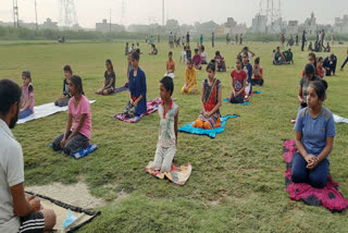 Women's advancement training institute did yoga with children in muradnagar