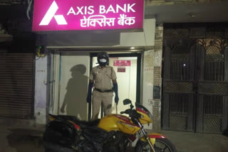 police checking atm in night