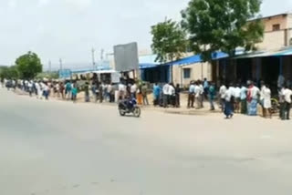 people gathered at liquor shops in kadapa town