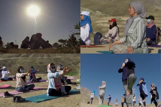 A group of yoga enthusiasts gathered on an Afghanistan for Yoga day