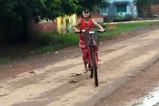 girl rides a bicycle