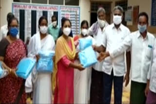 veerulapadu mandal bjp leaders distributed ppe kits to hospital staff