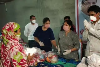 wife of MP Sanjay Singh distributed necessary items among  children and women