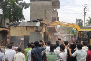 The NH authorities started work on the national highway by clearing the land of Trimohini , south dinajpur