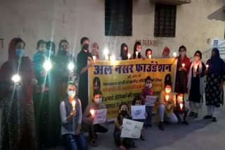 tribute to the martyrs by holding a candlelight march in jaipur rajasthan