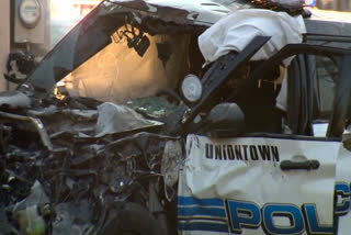 man saves officer from burning car