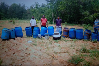 cops damaged local alcohol in rolugunta at vishakapatnam