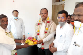 Former Mla CS Nadagowda who honored the new APMC president