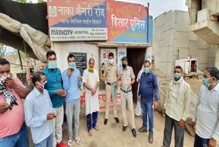 BJP leaders mask and sanitizer distribution campaign hisar