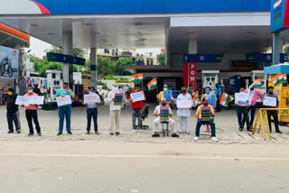 Congress protest against increased prices at petrol pump in ghaziabad