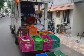 owner of brass band selling vegetables