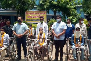 MLA Sudesh Rai distributed tricycle stick and wheel chair to 103 disabled persons