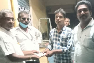 purse given by four people in ravulapalem mandal