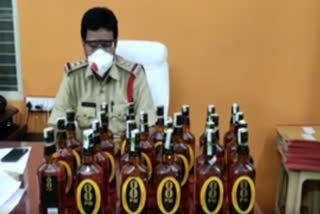 karnatka liquor seized in adoni two arrested