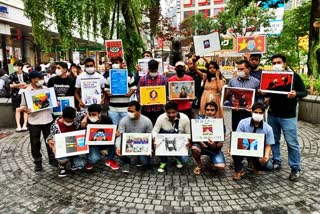 human-rights-activists-stage-demonstrations-against-china-at-hachiko-statue-in-tokyo