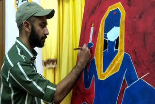 person in Nahan making people aware of Corona with his painting