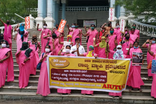 Asha workers protests to demanding a monthly payment of Rs 12,000