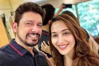 Madhuri experiments with husband's hairstyle