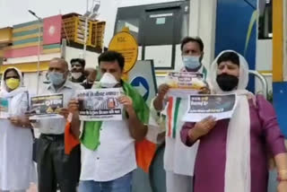 Congress workers protest against rising prices of petrol and diesel in Vasant Kunj