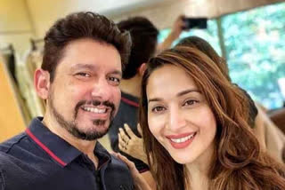 madhuri experiments with husband hairstyle